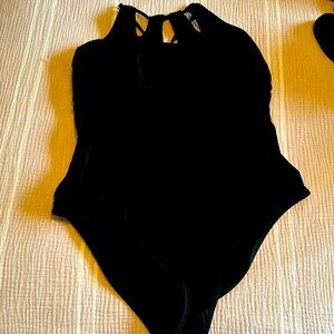Black one piece swimsuit size women’s XL.  Very slimming.  Nice spandex material
